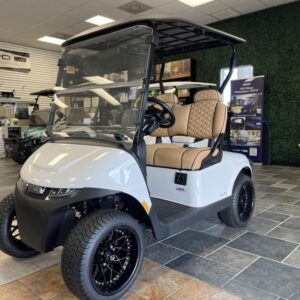 Side view of 2024 E-Z-GO Freedom RXV ELiTE Lithium Bright White in Orlando Florida