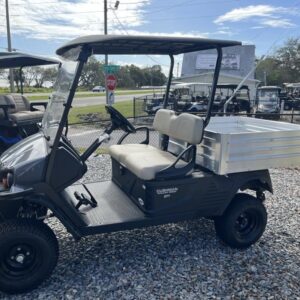 Side profile of the 2025 Cushman Hauler 1200X Gas utility cart in Naples, Florida.