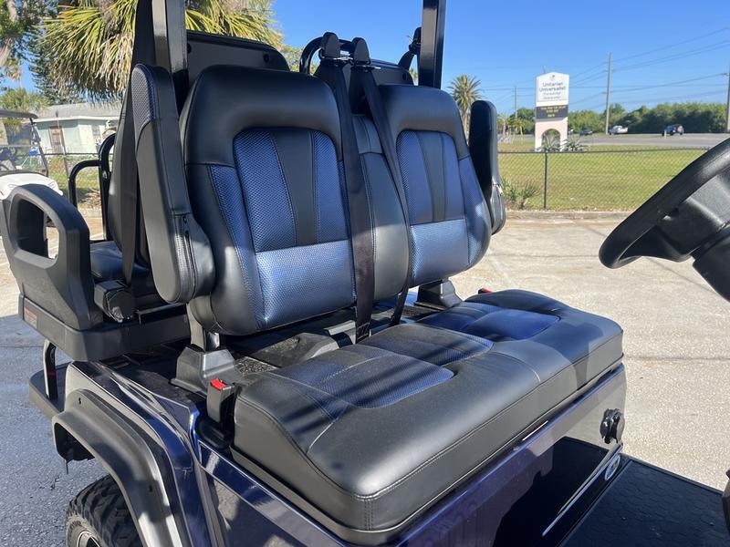 Side profile of 2025 Evolution D5-Maverick 2+2 four-passenger electric golf cart