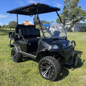 Front view of 2025 Evolution Forester 4 Plus black electric golf cart available in Tennessee with nationwide delivery and export options