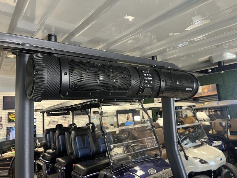 Lifted suspension and all-terrain tires of 2025 Star EV Sirius 2+2 at Sea Pines Resort.