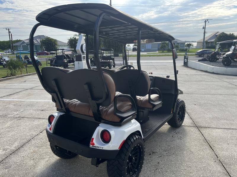 Interior seats of 2025 E-Z-GO Liberty ELiTE Lithium Bright White in Los Angeles California