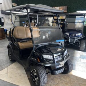 Side profile of 2026 Club Car Onward 4 Passenger XR Lithium golf cart with lifted stance