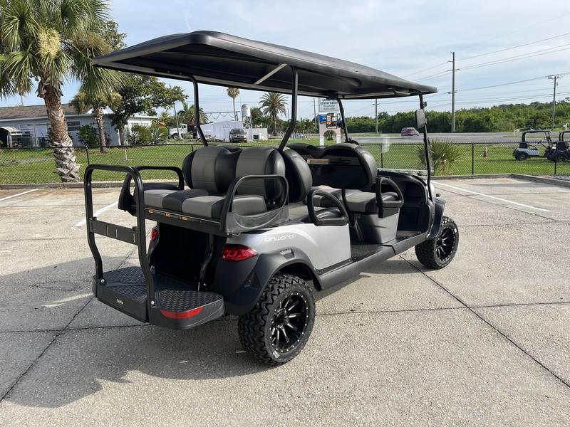Side view of 2026 Club Car Onward Lifted 6 Passenger Gas silver golf cart in Pennsylvania