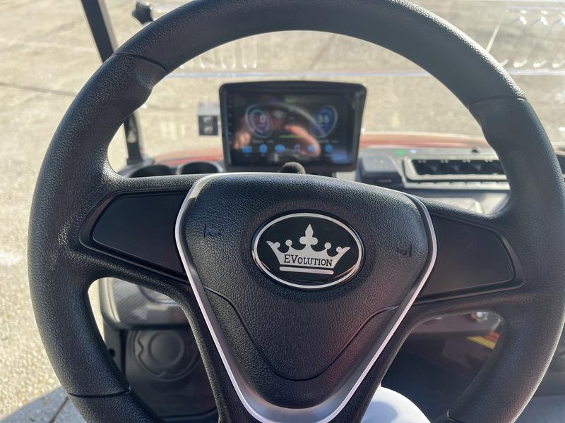 Street legal 2025 Evolution D5-Maverick 2+2 four-passenger golf cart on road